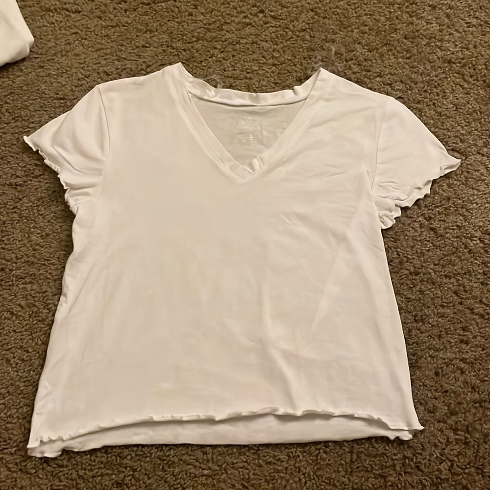 Urban rebel brand a very great brand btw Plain white V shirt trendy shirt